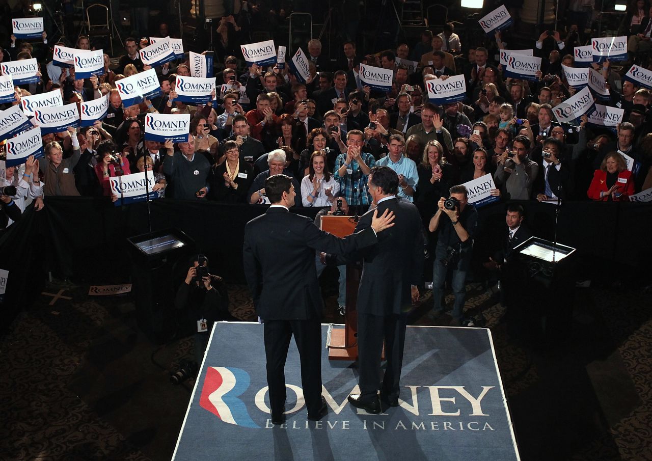 Ryan, left, and Romney greet each other on stage April 3, 2012, during the primary night gathering at The Grain Exchange in Milwaukee.