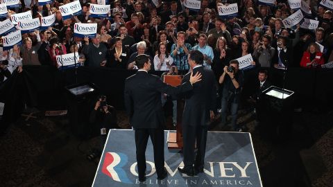 Ryan, left, and Romney greet each other on stage April 3, 2012, during the primary night gathering at The Grain Exchange in Milwaukee.