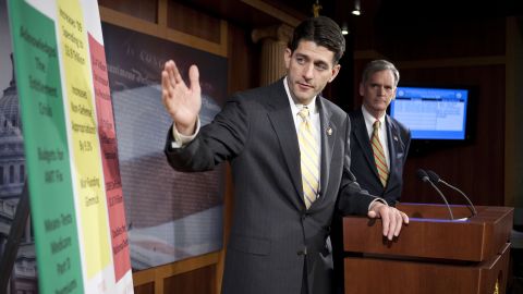 Ryan, left, and Sen. Judd Gregg of New Hampshire speak to reporters about the 2010 federal budget.