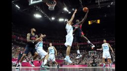 LeBron James, No. 6 of the United States, goes up for a shot against Luis Scola, No. 4 of Argentina, during the men's basketball semifinal match on August 10. The games ran through August 12 -- check out the best moments from Day 13 of competition on Thursday.