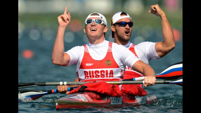 Yury Postrigay and Alexander Dyachenko of Russia celebrate winning the gold medal in the men's kayak double 200-meter canoe sprint final.