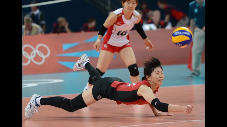 Japan's Risa Shinnabe dives to reach the ball during the women's volleyball bronze medal match. Check out photos from the<a href="http://www.cnn.com/2012/08/12/worldsport/gallery/olympics-day-sixteen/index.html" target="_blank"> last day of the Games </a>on Sunday, August 12.
