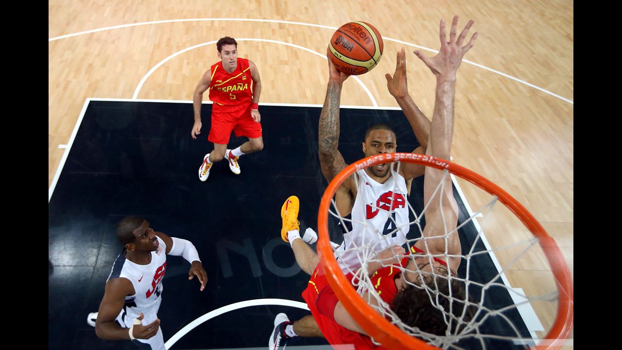 Tyson Chandler takes the ball to the hoop in the men's basketball gold medal game between the United States and Spain at North Greenwich Arena in London.
