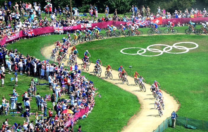 Cyclists speed through the course during the men's cycling cross-country mountain bike race at Hadleigh Farm.