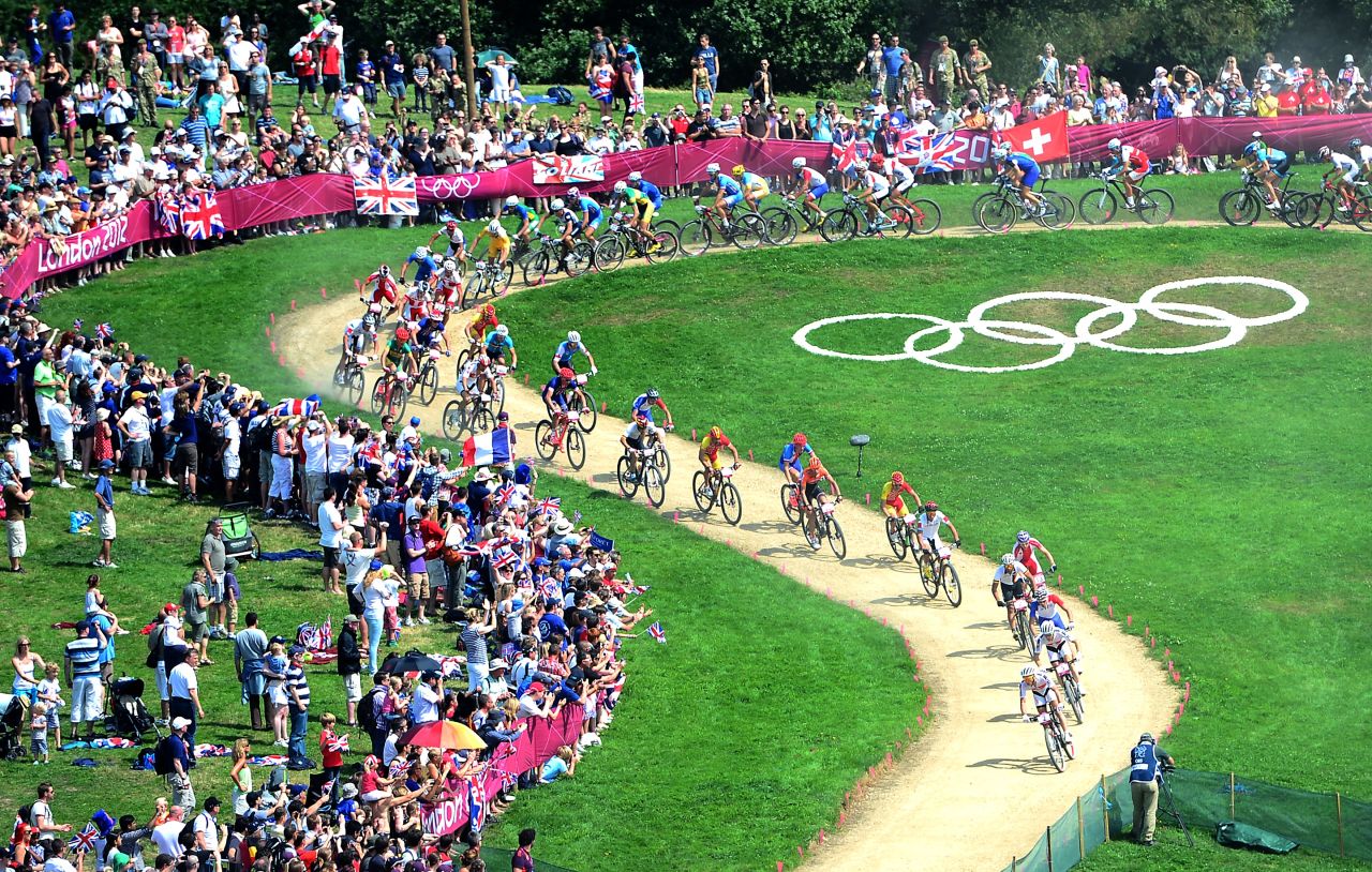 Cyclists speed through the course during the men's cycling cross-country mountain bike race at Hadleigh Farm. 