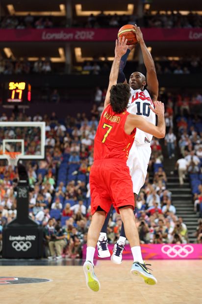 Kobe Bryant of the United States shoots a three-point shot over Juan-Carlos Navarro of Spain.