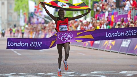 Stephen Kiprotich of Uganda celebrates as he wins the men's marathon on Sunday.