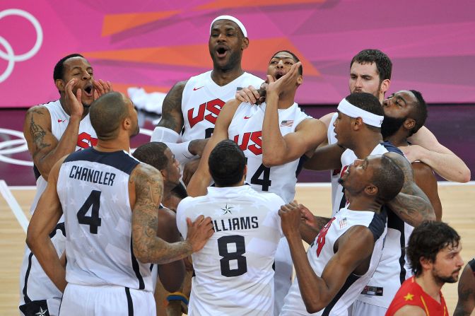U.S. players celebrate after defeating Spain to win the gold medal in men's basketball.