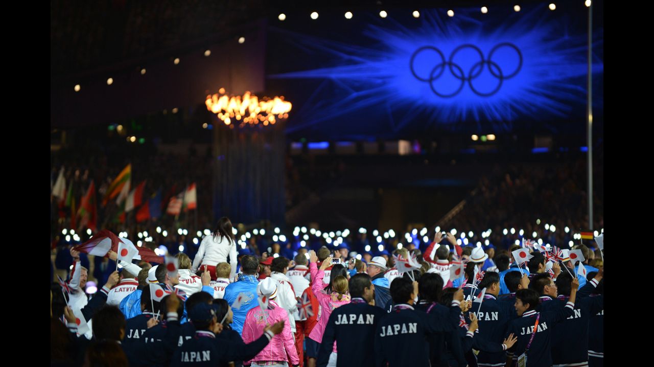 Athletes from the 30th Olympics enter Olympic stadium in London.