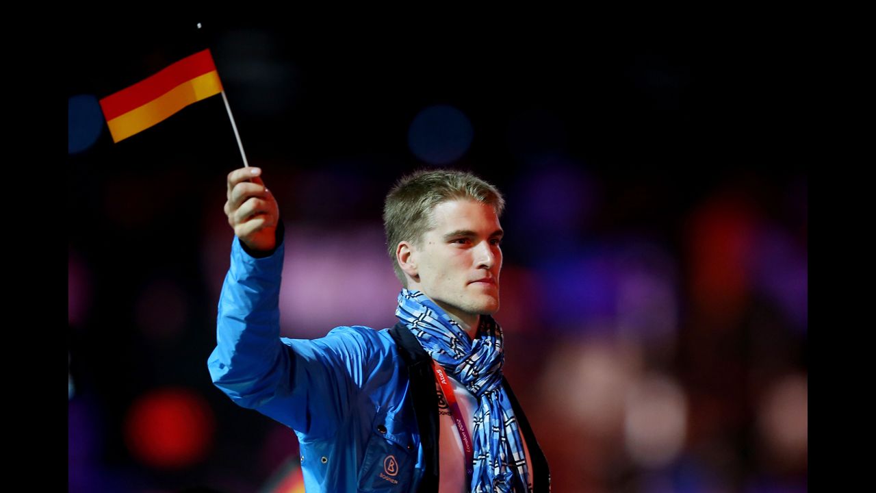 An athlete from Germany parades through the stadium during the closing ceremony of the 2012 Olympic Games.