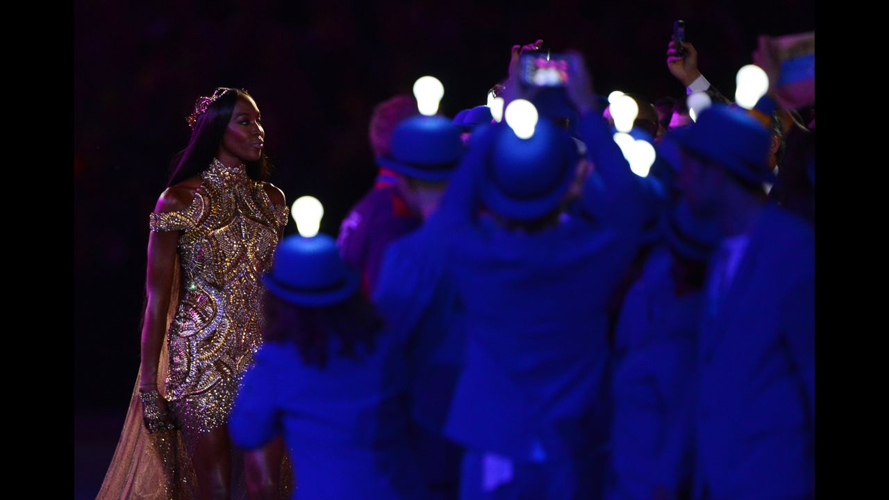 British model Naomi Campbell, left, performs during the fashion segment of the ceremony.