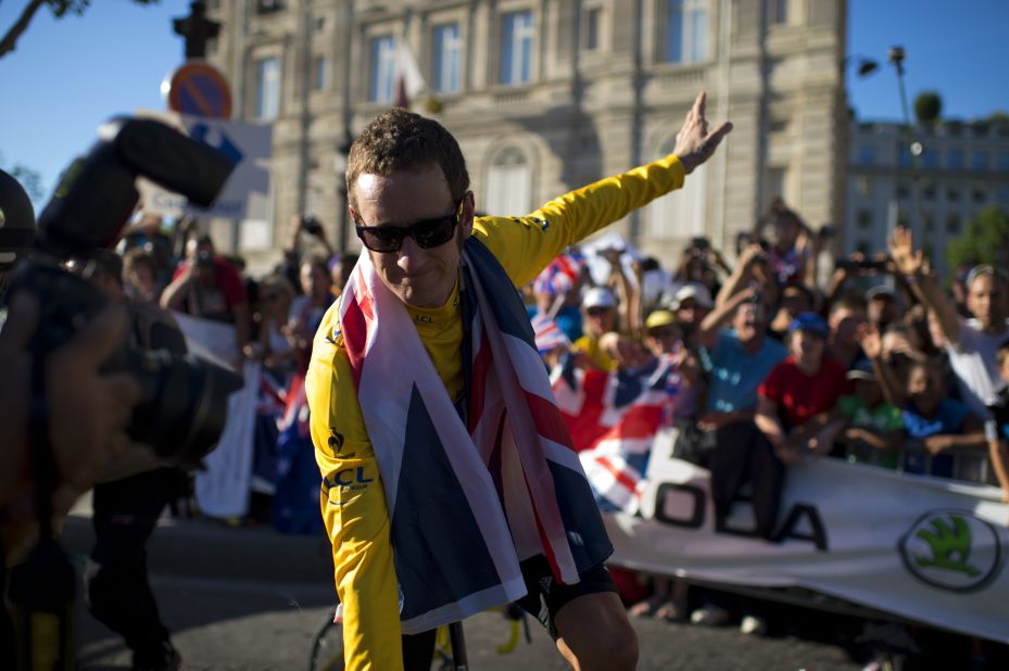 Wiggins lapped up the acclaim on the Champs-Elysees after his landmark victory was confirmed. Thousands of British fans made the trip to Paris to toast his achievement.