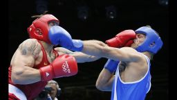 Oleksandr Usyk of the Ukraine, in red, defends against Clemente Russo of Italy, in blue, during the heavyweight boxing final. Usyk won gold on a 14-11 points decision on Day 15 of the London 2012 Olympic Games on Saturday, August 11. Check out the best images from Day 14 of competition on Friday, August 10. The Games ran through Sunday, August 12. 