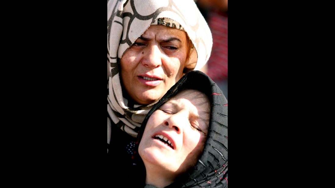 An Iranian woman cries after the earthquake.