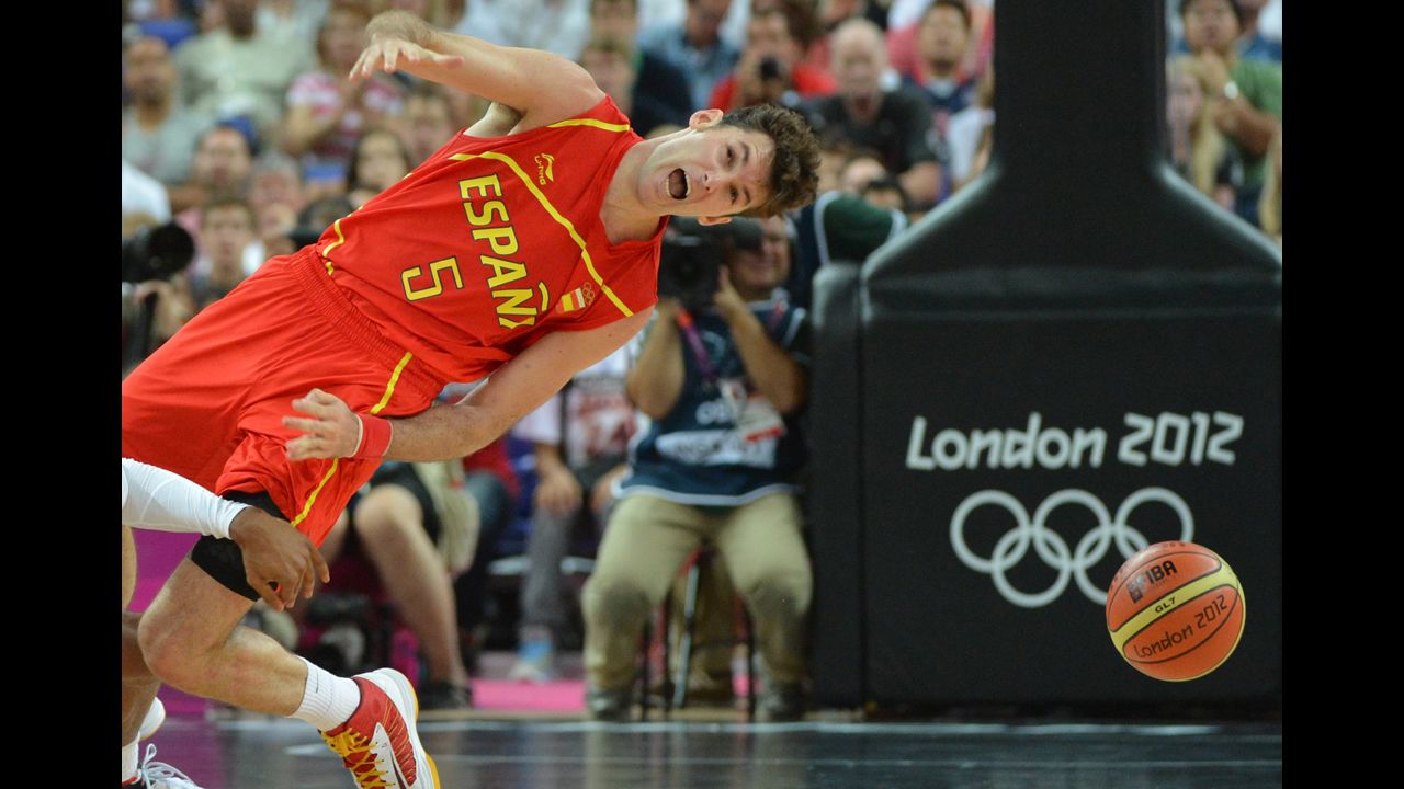 Spain's Rudy Fernandez is thrown off by the sudden lurch of the arena.