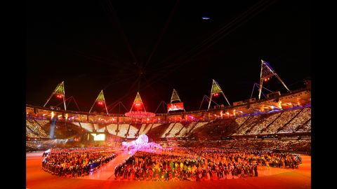 The athletes of the competing nations enter the stadium.