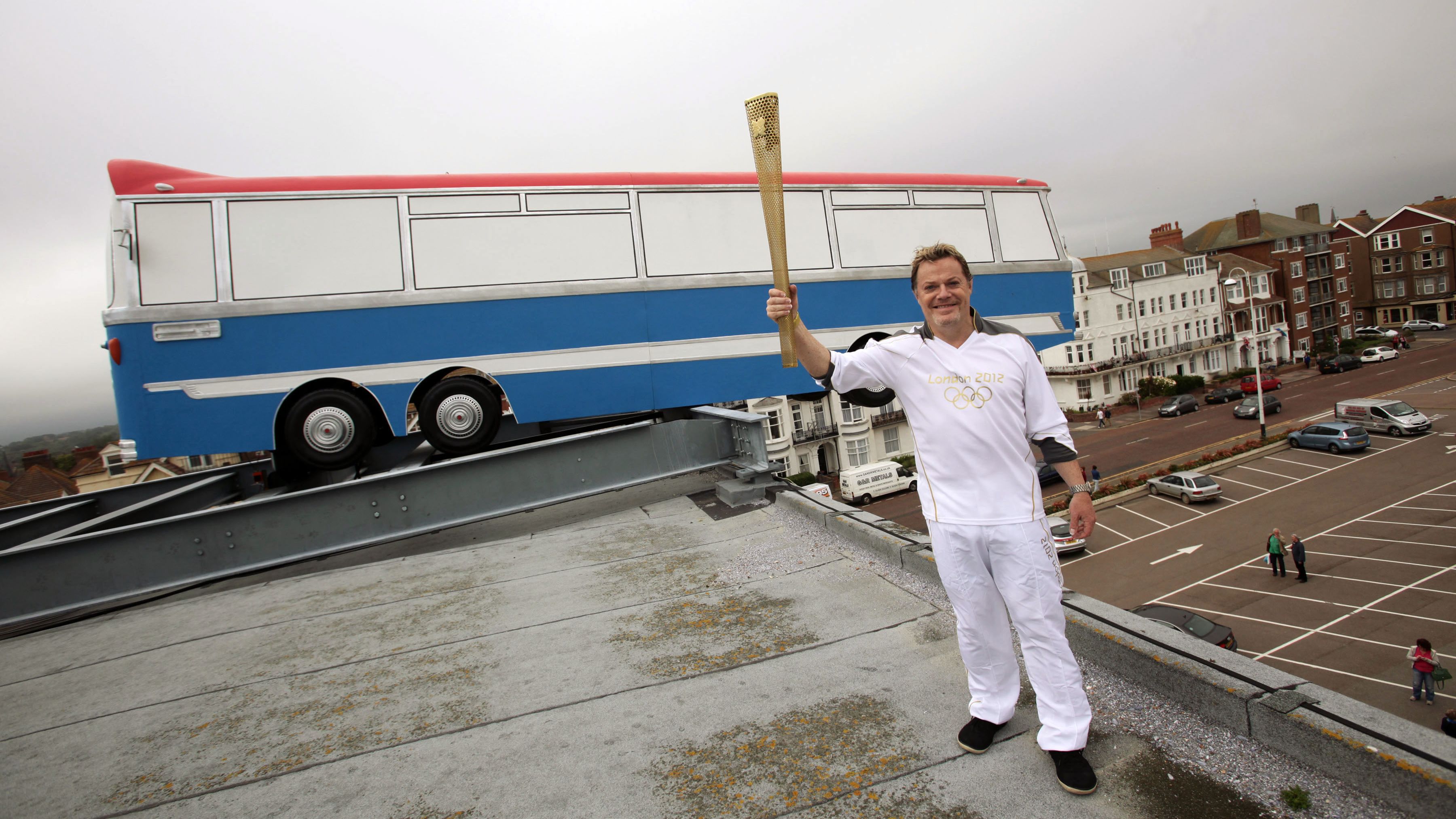 Comedian and actor Eddie Izzard carried the Olympic Torch on its journey around Britain prior to the London 2012 Games.