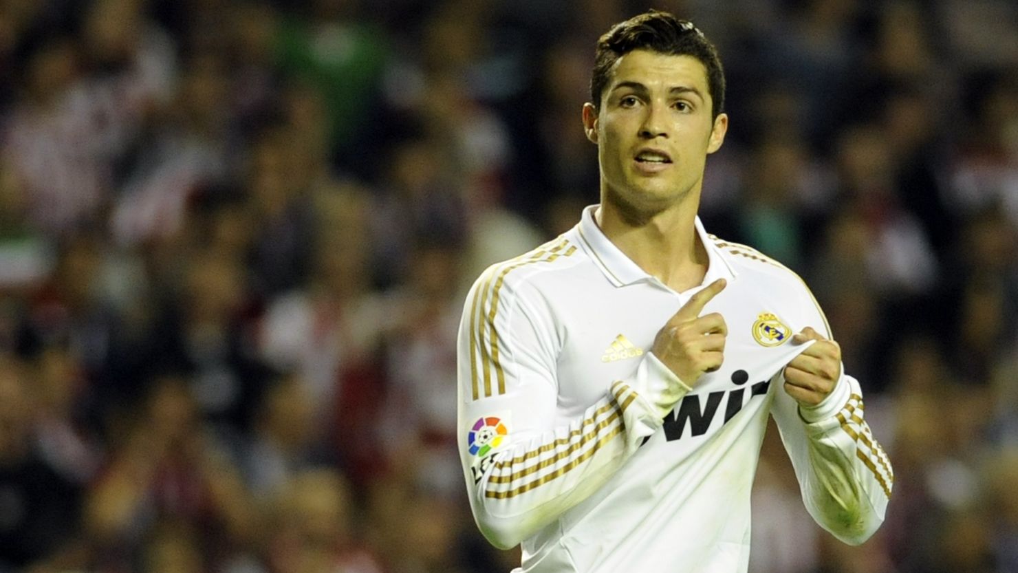 Cristiano Ronaldo celebrates Real Madrid's La Liga title - his first with the Spanish club