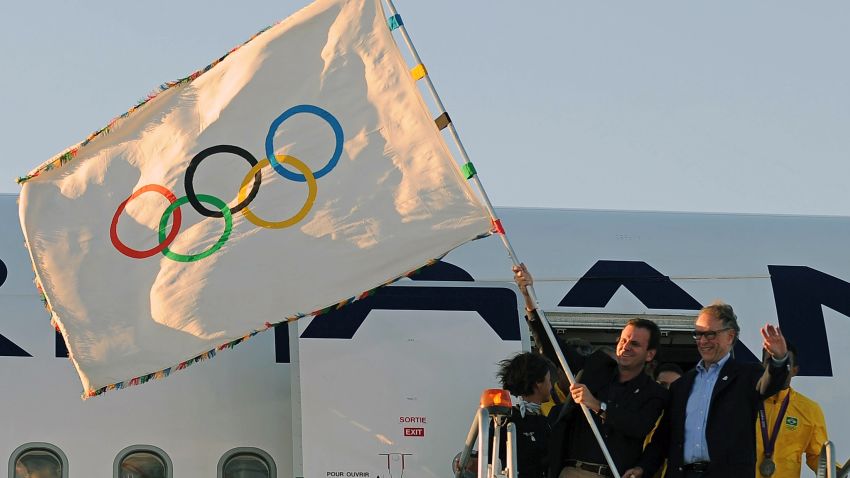 The Olympic flag arrives from the London 2012 Olympics, in Rio de Janeiro, on August 13, 2012