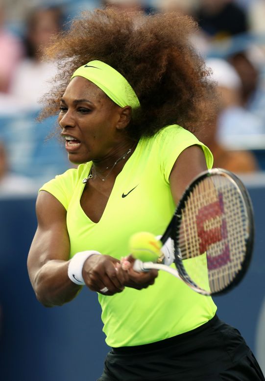 But despite using what she called "an '80s scrunchie," Williams' hair soon fought its way free in the windy conditions.