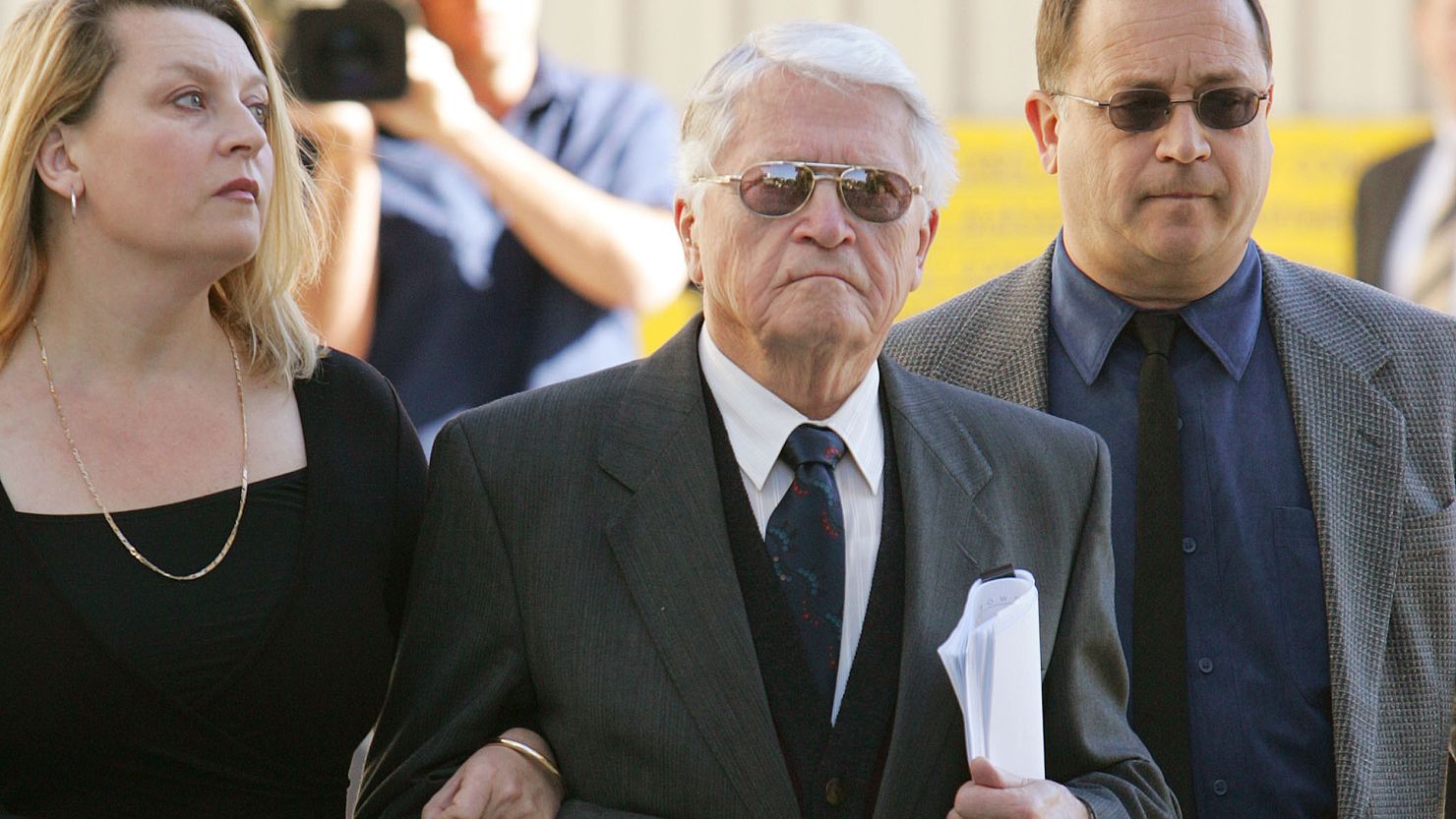 Alleged WWII war criminal Charles Zentai (C) leaves an extradition proceeding on July 19, 2005.