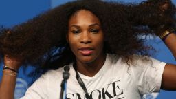 Serena Williams displays her "super crazy" hairstyle before her Cincinnati opener against Elena Daniilidou.