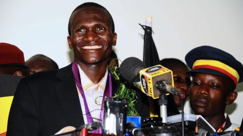 Ugandan Olympics marathon gold winner Stephen Kiprotich smiles during a press conference on arrival at Entebbe International Airport on August 15, 2012. 