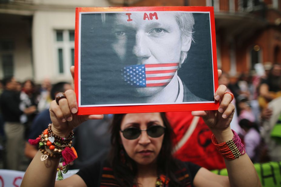 Protesters gather Thursday, August 16, outside the Ecuadorian Embassy in London, where WikiLeaks founder Julian Assange has been living since June. Ecuador announced it would grant Assange asylum over fears of political persecution.