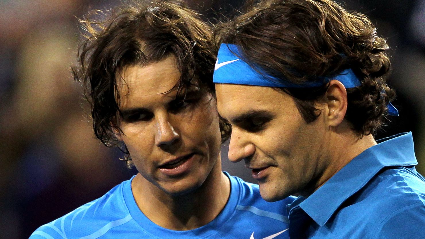 Rafael Nadal (left) and Roger Federer have played each other 28 times over the last nine years.