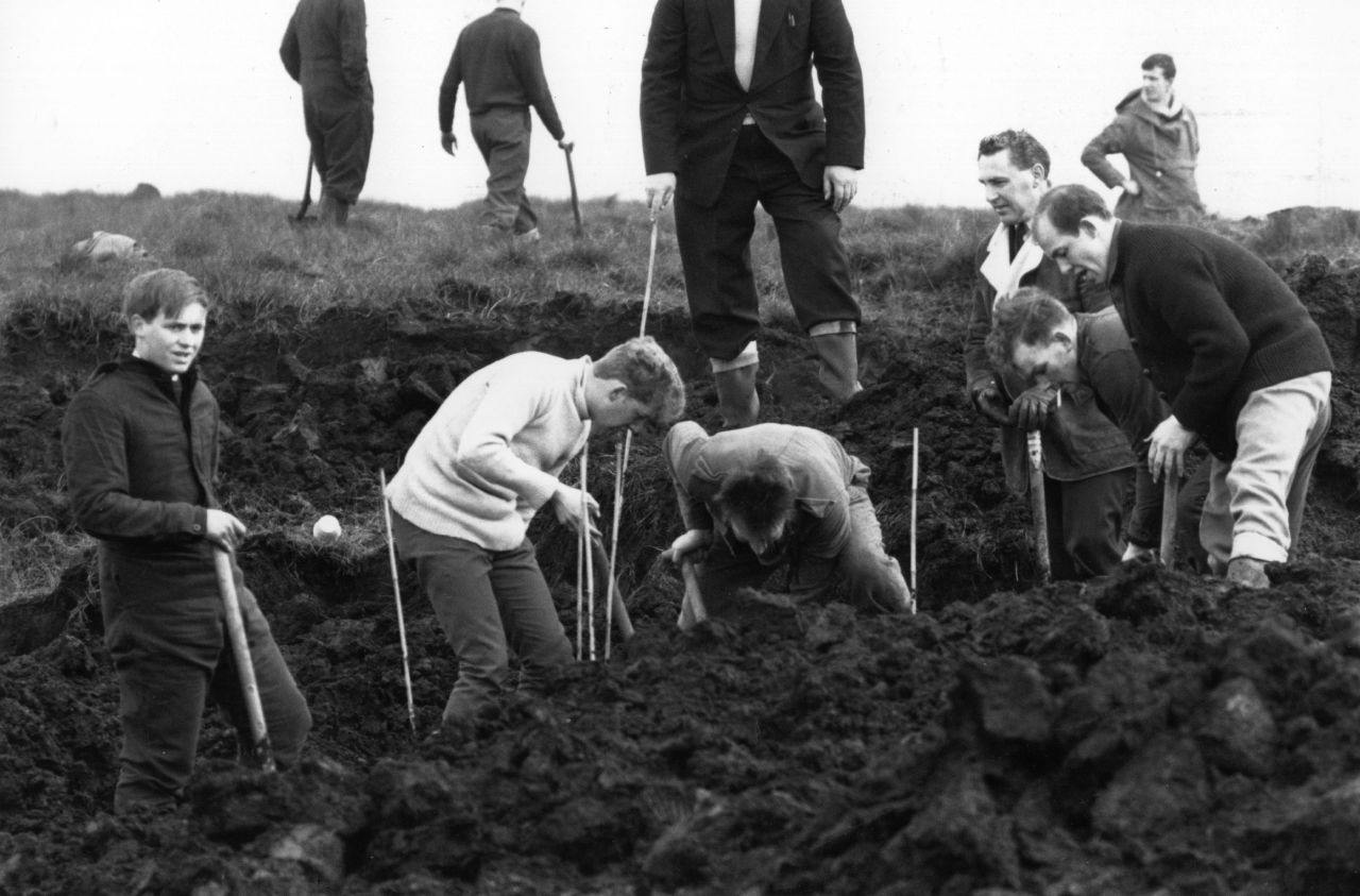 Policemen digging at the scene where the body of the fourth victim Lesley Ann Downey was found in 1965. In 1987 Brady and Hindley admitted to the killing of two other children, 16-year-old Pauline Reade and Keith Bennett.