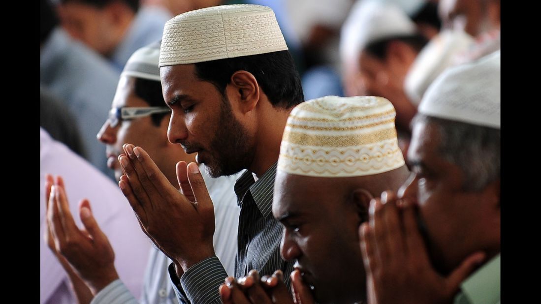 Sri Lankan Muslims take part in communal Friday noon prayers in Colombo.