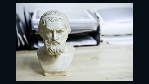 Among the items decorating Katz's office is a bust of Homer found at a garage sale.
