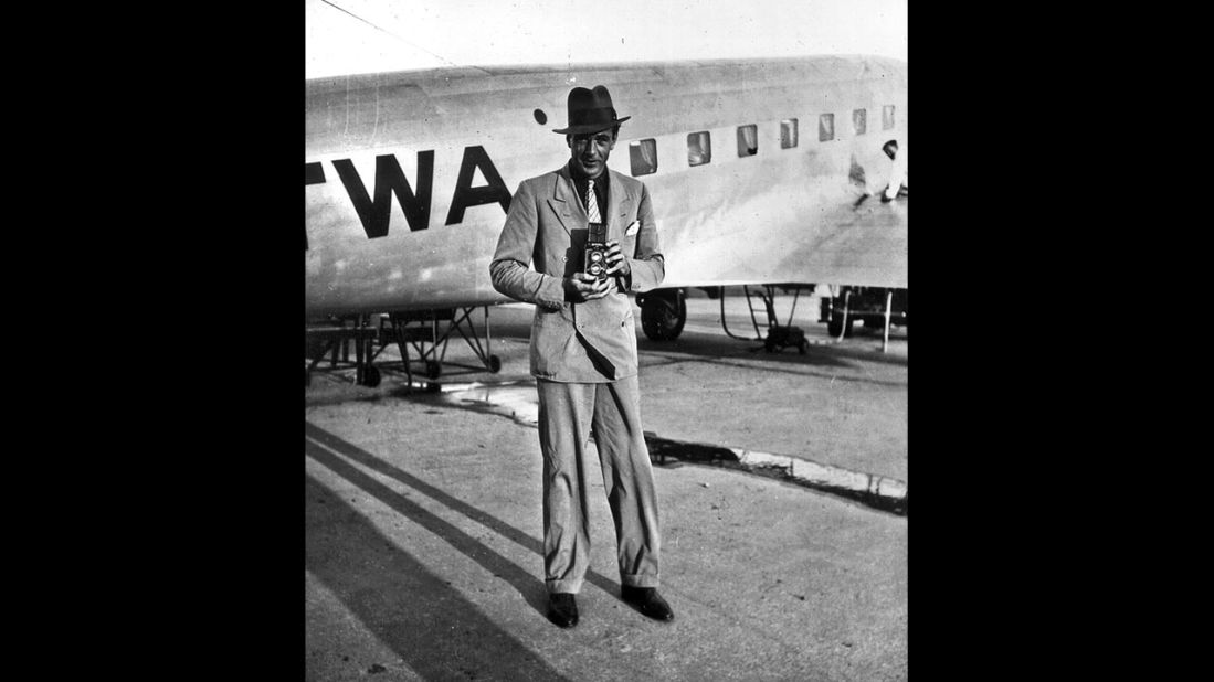 Gary Cooper turns his camera on Rotunno, also taking a picture, late 1930s.