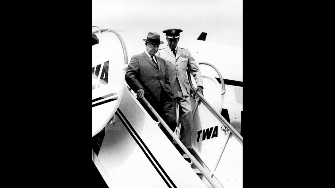 President Dwight D. Eisenhower steps from a TWA flight in the 1950s.
