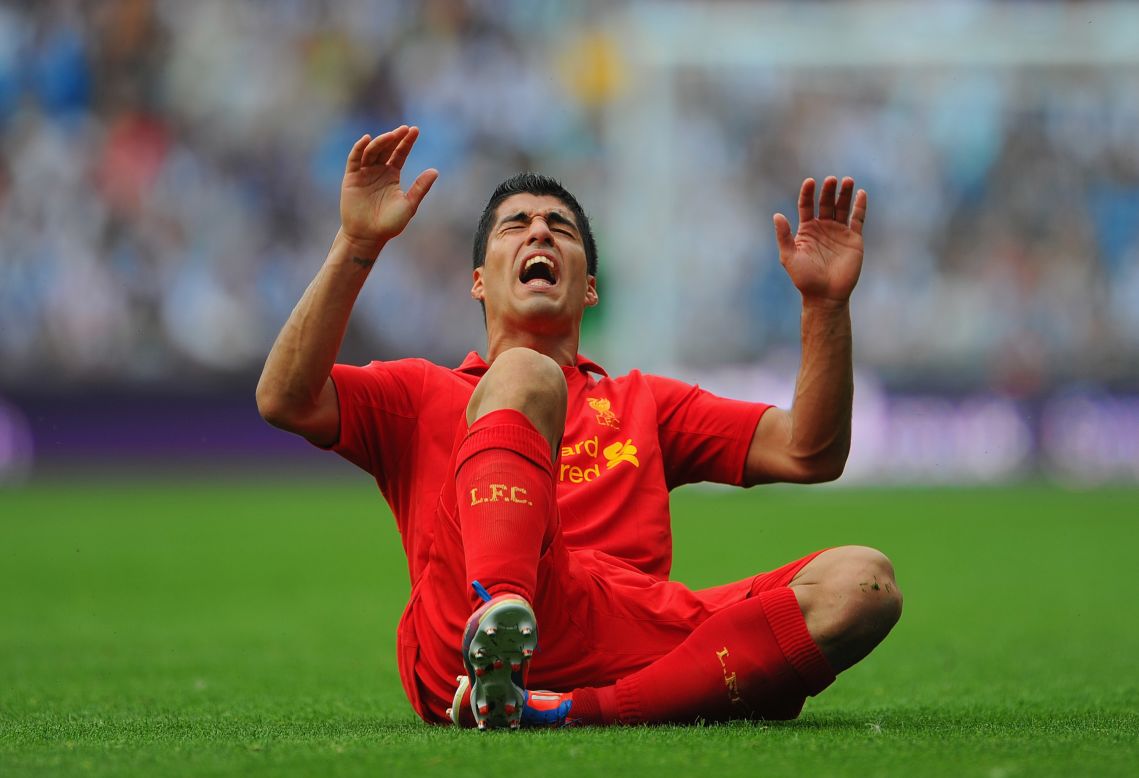 Stoke City boss Tony Pulis wants the Football Association to punish Liverpool's Luis Suarez for diving. "It's an embarrassment," said the Stoke manager after a 0-0 draw at Anfield. "The FA should be looking at this."