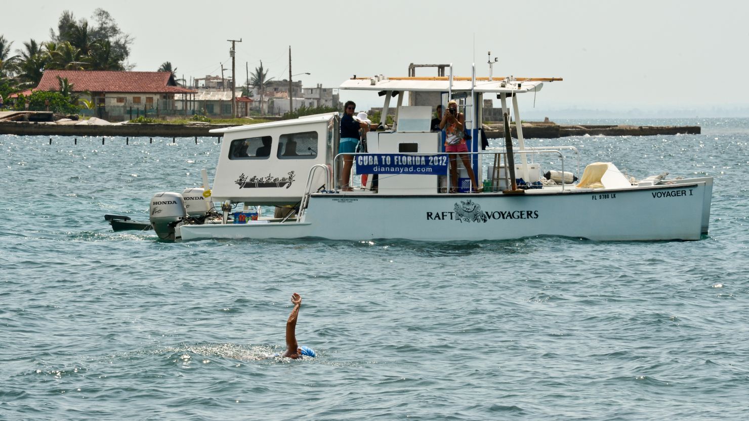 Diana Nyad strokes through the water Saturday at the Ernest Hemingway Nautical Club in Havana as she begins her swim.