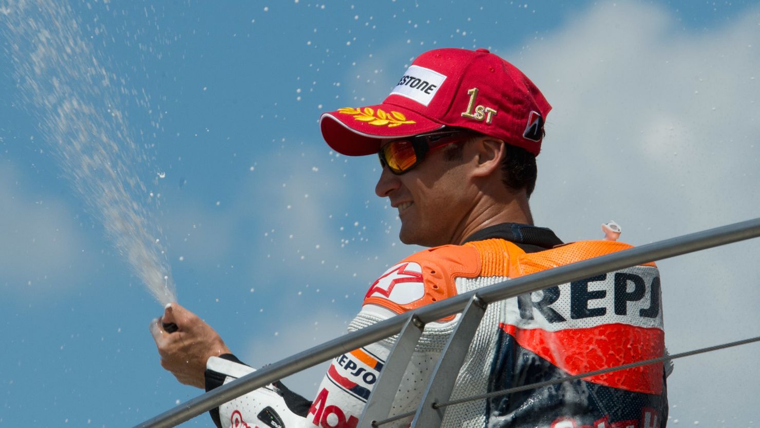 Dani Pedrosa celebrates his MotoGP win at Indianapolis in traditonal style.