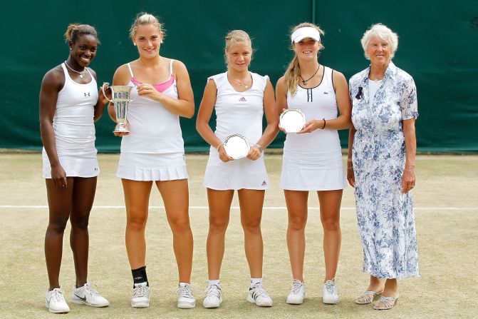 Her junior career included three consecutive doubles titles at the French Open, Wimbledon (pictured) and the U.S. Open with Timea Babos from Hungary (second left) in 2010.  