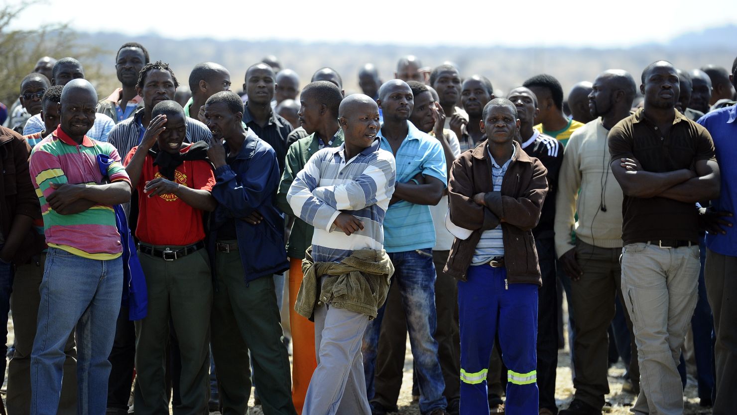 Striking platinum miners pictured at the mine on 20 August.