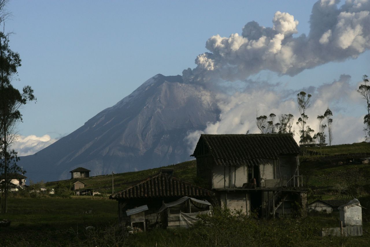 Clouds of gas and ash from Tungurahua are visible Monday, August 20, in Banos, a town at the foot of the volcano.
