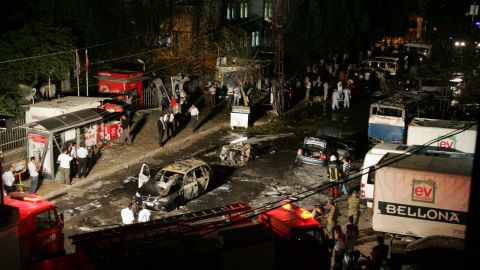 Firefighers and police surround the area where a car bomb went off Monday in the centre of Gaziantep, Turkey. 