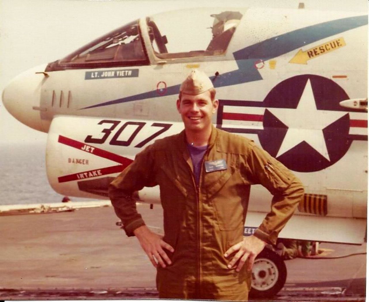 Bob Besal on the USS America in 1974 in the North Atlantic when he was a Lieutenant. Besal was piloting a Vought A-7C on a training mission when his aircraft collided with another plane at 15,000 feet, sending his jet into the Atlantic. He survived, but thought the plane lost.