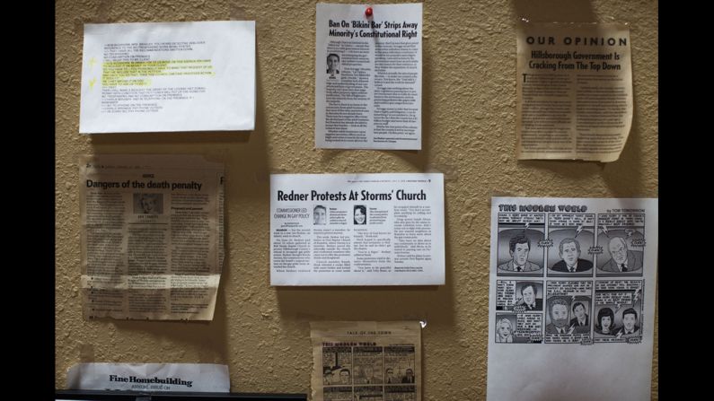 Newspaper clippings adorn the wall of Joe Redner's office. Redner opened the Mons Venus strip club in 1982 and has been fighting government opposition since that time. 