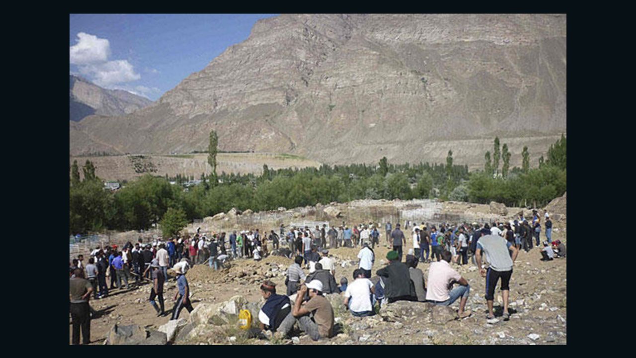 Pamiri people bury those killed during July 24 military action in Khorog, Tajikistan. 