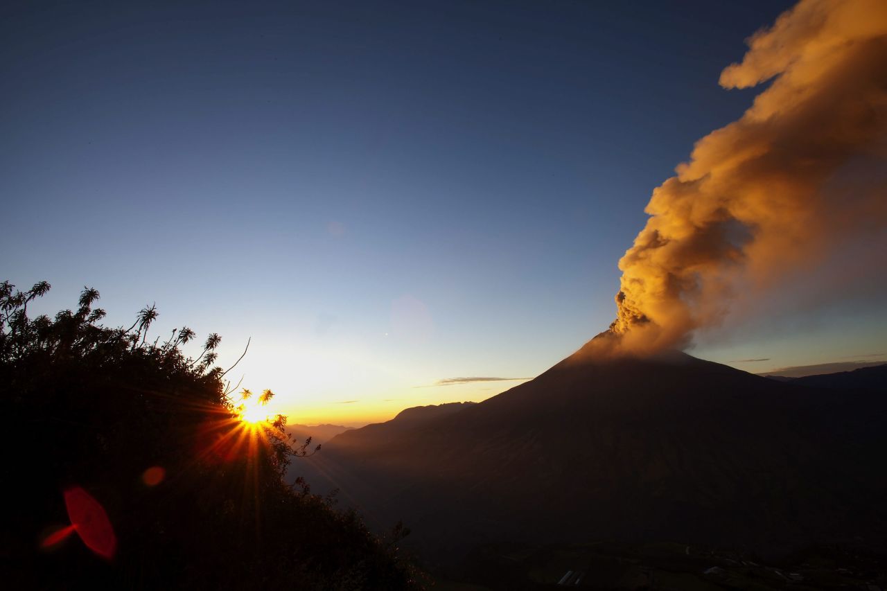 Smoke rises from the Tungurahua volcano in Huambalo, Ecuador, on Tuesday, August 21. Increased volcanic activity has led authorities to raise a security alert from moderate to high. The volcano is 87 miles (140 kilometers) south of Quito, Ecuador's capital. <a href="http://ireport.cnn.com/topics/293965">Are you there? Send us your pictures and video.</a>