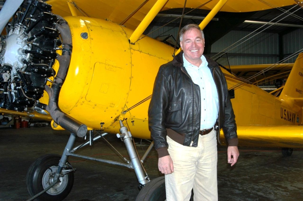 Bob Besal in 2008 in front of his N3N-3 Navy trainer in Carson City, Nevada.