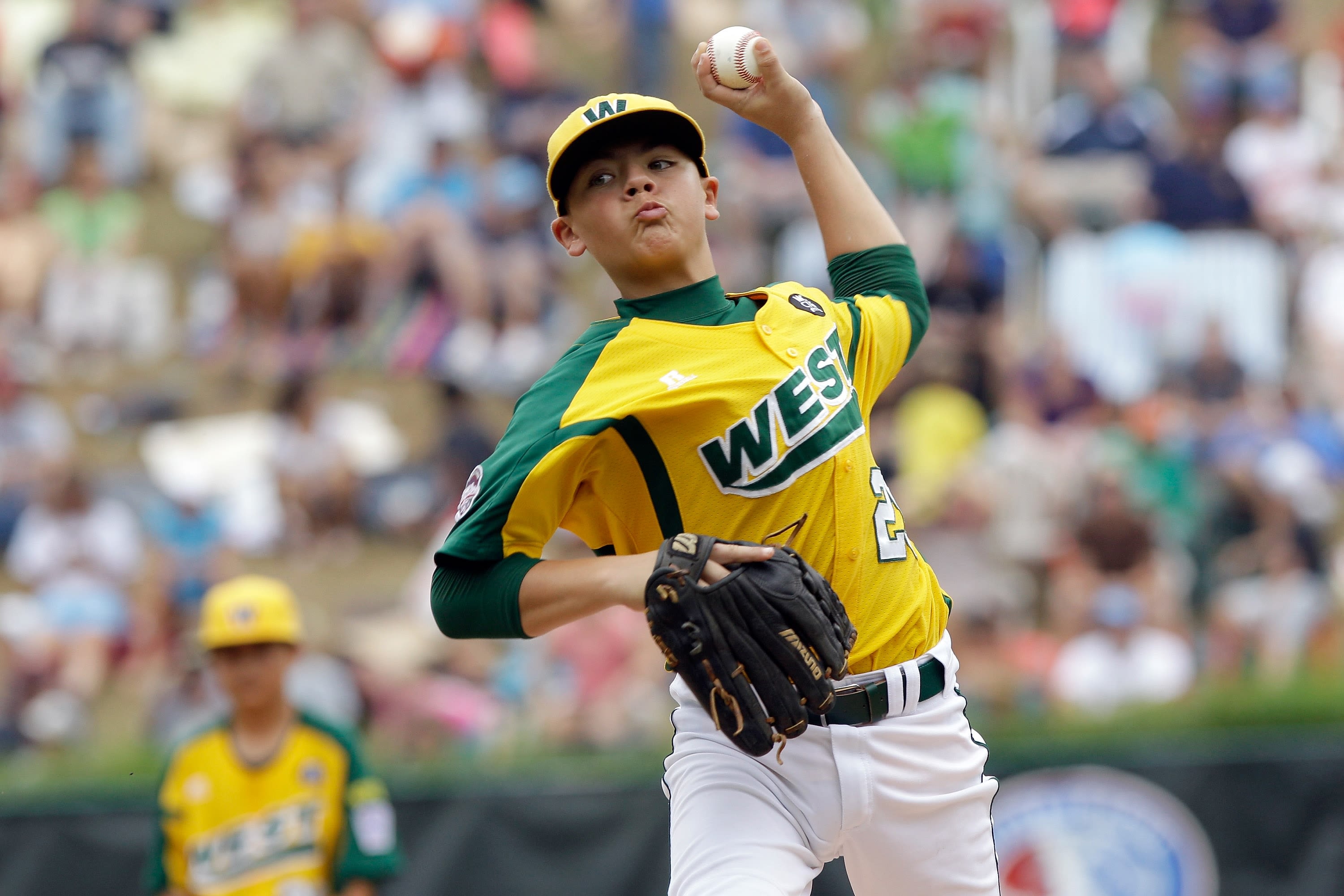 Should curveballs be banned in Little League Baseball?