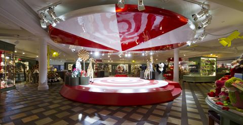 Department store Harrods' new "Toy Kingdom," which opened in July, organizes toys and games by themes like the Big Top, where magicians and jugglers are surrounded  by fancy costumes, doll houses, rocking horses and soft toys.