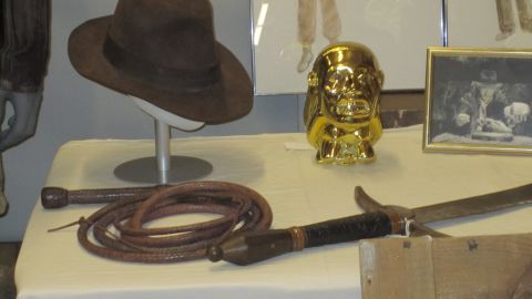 "Raiders of the Lost Ark" introduced scruffy archaeologist "Indiana Jones" to the world and his trademark fedora hat and whip. In the background sits the Chachapoyan fertility idol, "Indy's" removal of which literally brought the house down at the beginning of the film.