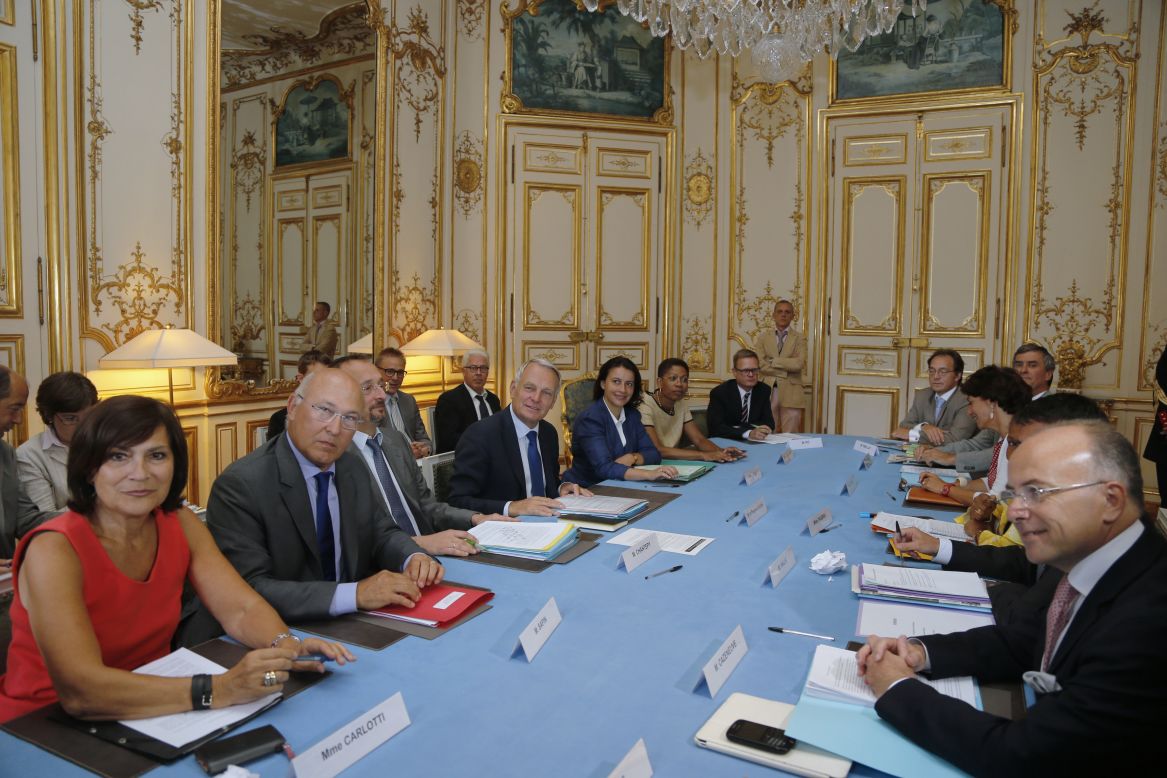 French Prime Minister Jean-Marc Ayrault, center left, heads a meeting with ministers and members of the Romeurope National Collective of Human Rights for emergency talks on the handling of an estimated 15,000 Roma living in camps across France on Wednesday, August 22, at the Matignon Hotel in Paris.
